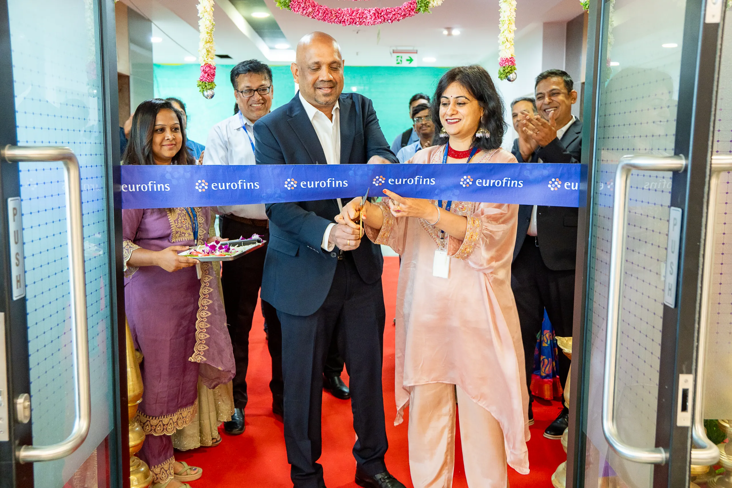 Ribbon cutting ceremony during the Eurofins office inauguration event in Bangalore.