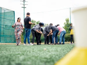 Employees participating in fun team building games during a corporate event